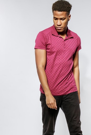 Cotton polo, short sleeves. The model measures 183cm and wears M