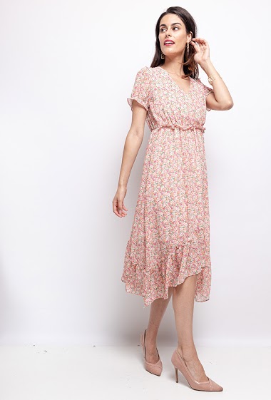 Dress with printed flowers. The model measures 176 cm