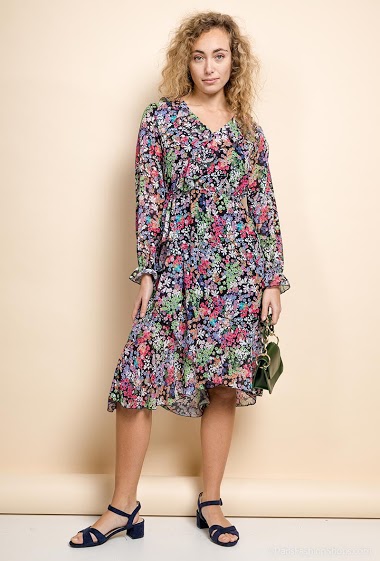 Flower print dress, ruffles, long sleeves. The model measures 171 cm