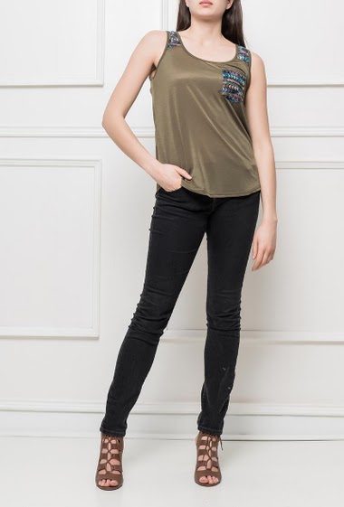 Tank top with embroideries, pocket, curved hem, casual fit