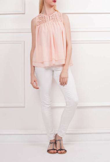 Double layered and flared top with lace panel, sleeveless