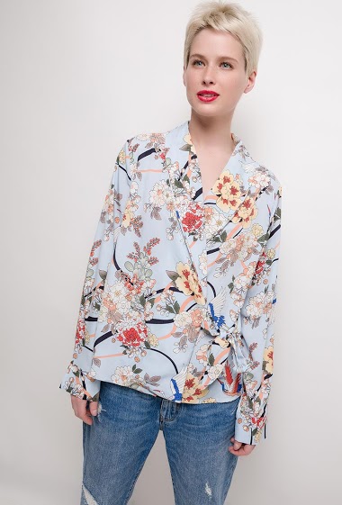 Blouse with printed flowers, long sleeves. The model measures 172cm and wears M. Length:65cm