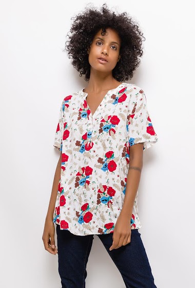 Printed blouse, short sleeves. The model measures 177cm and wears T2=12/14(UK)40/42(FR). Length:70cm