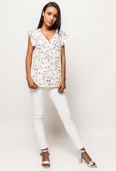 Short sleeve blouse, printed flowers. The model measures 172cm and wears S. Length:65cm